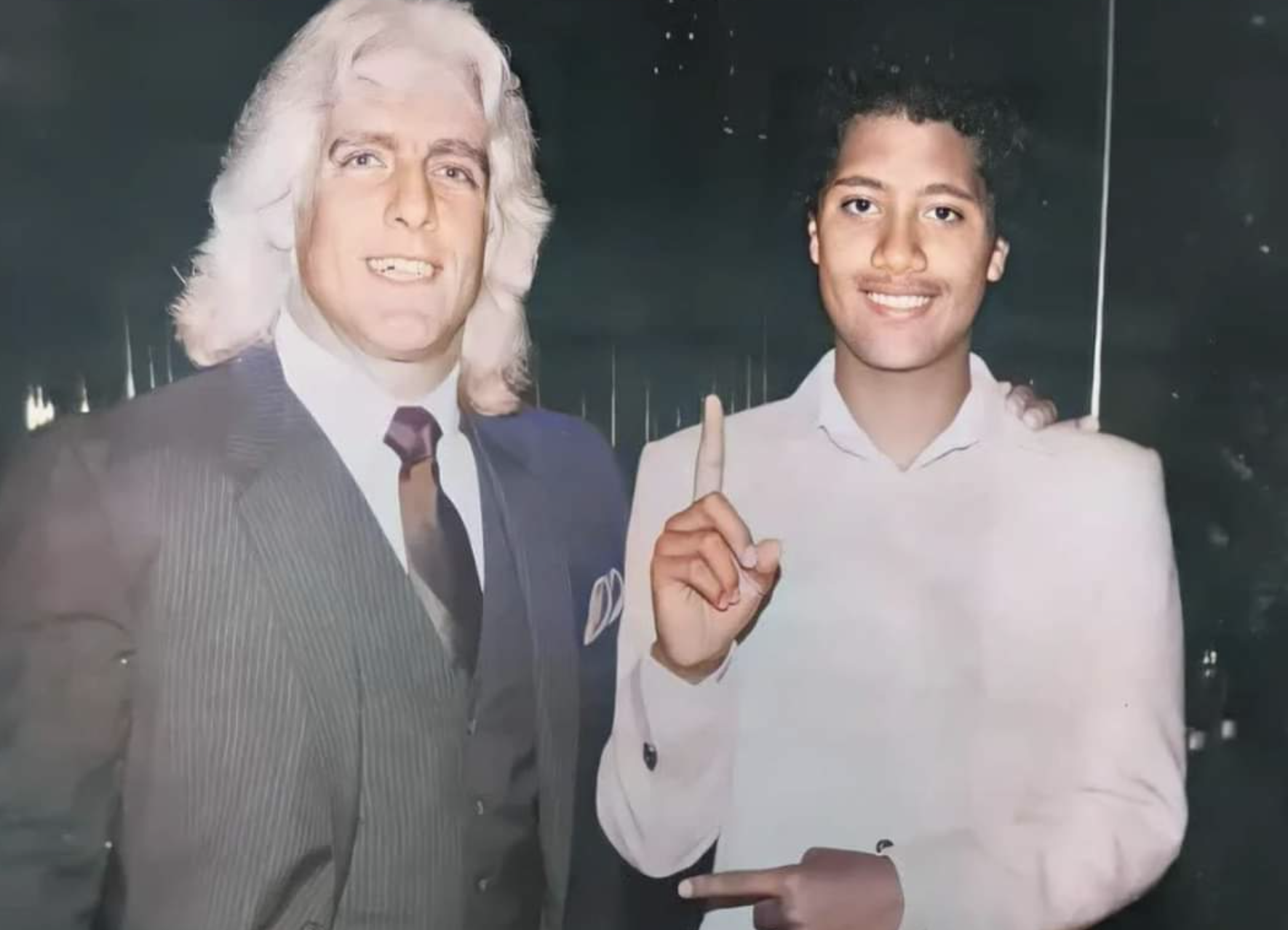 “Ric Flair meeting a 12-year-old Dwayne Johnson circa 1984.”